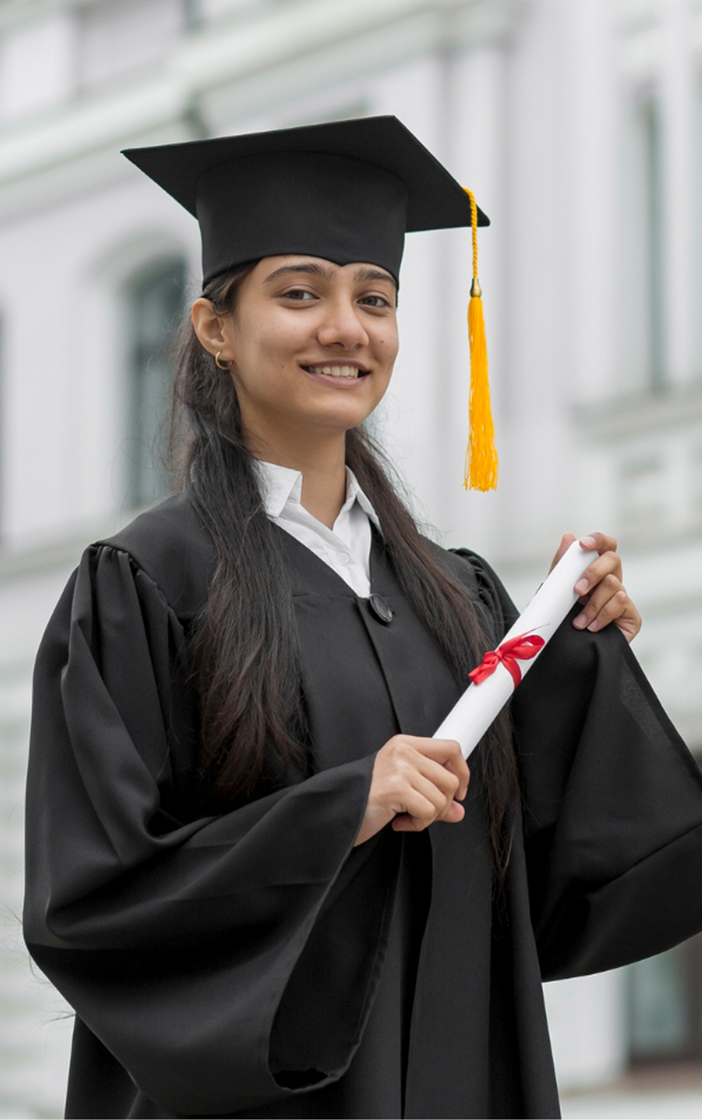 Law graduate holding her degree